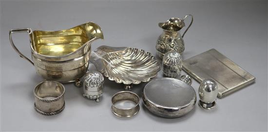 A Georgian silver and silver-gilt cream jug and sundry small silver items, 21oz
